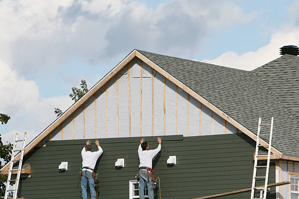 Professional Emergency Siding Repair technician working in Esmont, VA